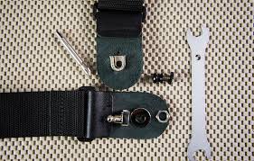 Tie one end through the loop on the end of the strap and the other end around the headstock of the guitar. How To Install Guitar Strap Locks Basic Guitar Reverb News