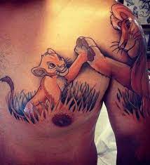 Disney Tattoos To Impress Your Inner Child 30 Photos Lion King Tattoo King Tattoos Disney Tattoos For Men