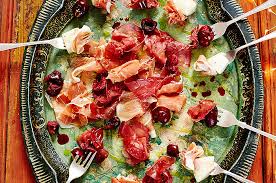 Tender and crisp chicken legs with sweet tomatoes. Party Jamie Oliver