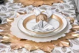 From gorgeous glass centerpieces that you spot in many wedding table setting ideas, to floral arrangements, to using crystal ware and antique gold rimmed cutlery, there are endless possibilities for an opulent wedding table setup. Beautiful Gold And Copper Fall Table Setting Entertaining Diva From House To Home