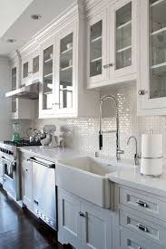 all white kitchen with mini subway tile
