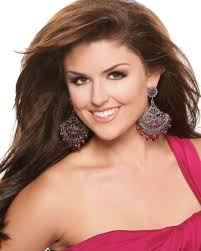 Miss Texas' first pitch off target at Rangers game