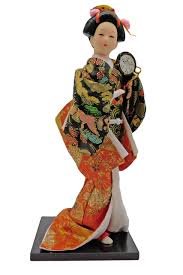 A geisha doll represents the women who provide entertainment to men in public places. Japanese Geisha Doll With Drum Oriental Furnishings Furniture Decor