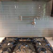 Glass mosaics are going to grow in another really popular trend involves arranging the tile into abstract images, like waterfall linear tile. Glass Tile Backsplashes