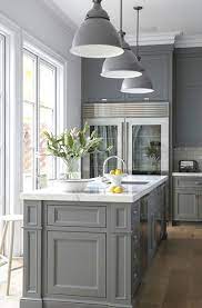 If your kitchen gets a lot of natural light, and the walls are also bright, the cabinets might be begging for a dark color to create definition. The Psychology Of Why Gray Kitchen Cabinets Are So Popular Luxury Home Remodeling Sebring Design Build
