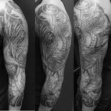 Black And White Upper Arm Half Sleeve Tattoos For Men 50 Japanese Phoenix Tattoo Designs For Men Mythical Ink Ideas Sleeve Tattoos Tattoo Designs Men Phoenix Tattoo