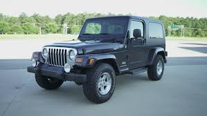 Image result for Brilliant Black 2005 Jeep