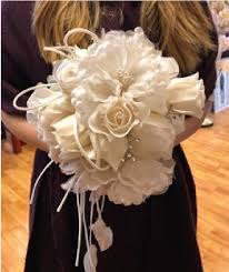 Finding the right flowers to accompany the silk bridal bouquet is one of our specialties. Custom Bridal Bouquet M S Schmalberg