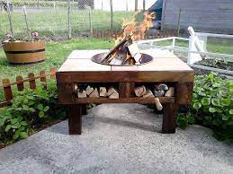 Check out our fire pit table selection for the very best in unique or custom, handmade pieces from our fire pits & wood shops. Diy Pallet Fire Pit Table With Firewood Storage