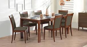 Your dining table set 4 seater can be easily extended to 6 seater dining table just by pulling the upper surface. Vanalen 6 To 8 Extendable Dalla 6 Seater Glass Top Dining Table Set Urban Ladder