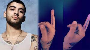 You cut out tattoo lightsaber and place on finger. Zayn Shows Off Love For Star Wars With New Light Saber Tattoo Youtube