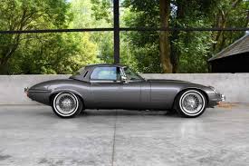 Its combination of beauty, high performance, and competitive pricing established the model as an icon of the motoring world. This 1974 Jaguar E Type Series 3 V12 6 1 Restomod Is Just Perfect
