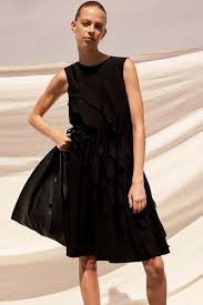 The Usha Technique ​ Long-time COS collaborator, Usha Doshi, experimented  with sustainable folding and cutting methods this season. The result? A  capsule collection with ruffled textures, created with minimal waste.​  'I've been