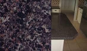 Wilsonart sheet laminate, 4551 blackstar granite, displays a small scale granite with a blend of dark grey, black, and light grey with accents of soft coral. Wilsonart Blackstar Granite Royal Home Wilsonart Laminate