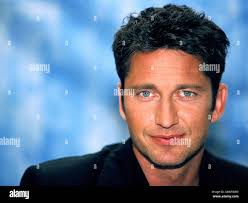Gerard butler lara croft tomb raider hi-res stock photography and images