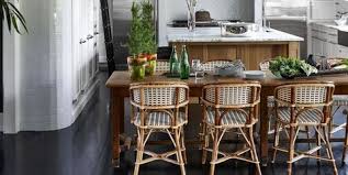The brown couch looks perfect together with the room's style. Black Flooring Black Wood Flooring
