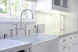 Galley Kitchen S Farmer S Sink With Perrin Rowe Bridge Faucet White Glass Front Cabinets And Vintage Kitchen Faucet Apron Front Kitchen Sink Farmhouse Sink