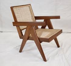 This woven chair is taking the design world by storm. Pierre Jeanneret Teakwood Easy Chair Furniture Modern Furniture Easy Chair