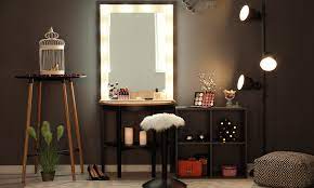 The vanity mirror features white light bulbs that illuminate the black dressing table well. 7 Dressing Table Lighting Ideas For Your Home Design Cafe