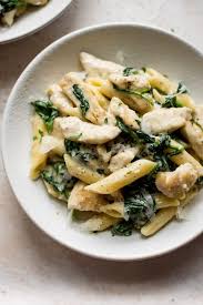 This Creamy Spinach Chicken Pasta Recipe Is Quick And Oh So Tasty Parmesan Makes It W Creamy Chicken Spinach Pasta Spinach Pasta Recipes Chicken Spinach Pasta