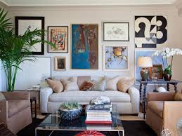 Traditional living room with a classic fireplace and beige seats paired with a dark wood coffee table, a coffered ceiling mounted with a fan add elegance to the. Small Shared Kids Room Storage And Decorating Kids Room Ideas For Playroom Bedroom Bathroom Hgtv Modern Living Room Wall Living Room Designs Home Decor