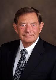 Above) “Coach” Leonard McCullough poses proudly with his son Carnival  Memphis King James McCullough, Jr. and Queen Suzette