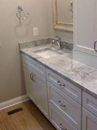 Floors are leonia gray tile. Super White Counters Paint Is Sherwin Williams Agreeable Gray Merrilat Cabinets Agreeable Gray Agreeable Gray Sherwin Williams Grey Cabinets