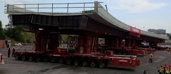 The special vehicles are also widely used to carry over length goods that. Mammoet Referenz Ottawa Einsatz Von Spmt Bei Uberfuhrung