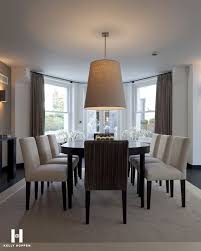 A likewise long kitchen, at one end of which is a more friendly dining area, completes a triumvirate of zones. Pin By Lisa Drennan Durose On Design Kelly Hoppen Dining Room Accessories Dining Room Inspiration Dining Room Decor
