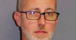 Music teacher Ken Johnson, currently