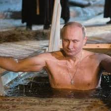 Vladimir putin was born in 1952 in leningrad (now st. President Putin Plunges Into Icy Water To Mark Epiphany Bbc News