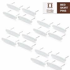 You can get specific bed skirt pins that are meant to fasten bed skirts in place. Bed Skirt Dust Ruffle Pins Pack Of 16 Pins Keeps Bedskirt In Place 603981260502 Ebay