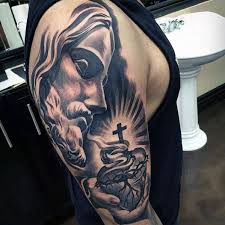 Some jesus tattoos depict him as sorrowful while others go with a more serene looking jesus tattoo. 275 Amazing Jesus Tattoo Designs And Ideas Body Art Guru