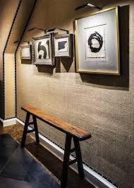 A Rustic Wall Covering Made From Burlap Upholstered Walls Burlap Wall Faux Stone Walls