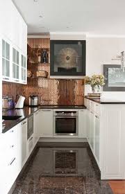 Tiny Copper Tiles Marble Floors And White Cabinets Copper Kitchen Backsplash Kitchen Remodel Small Kitchen Remodel