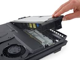 Unscrew the metal plate and clean the fan with air and a toothbrush. Playstation 4 Pro Teardown Ifixit