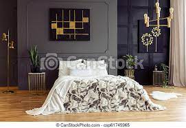 Find the best wallpaper rolls & sheets at the lowest price from top brands like york, anthropologie, roommates & more. White Pillows On Patterned Bed In Grey Bedroom Interior With Black And Gold Posters Real Photo Canstock