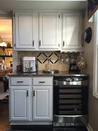 The old wood bifold doors; Diy How I Painted My Kitchen Cabinets White Cottage Home Living