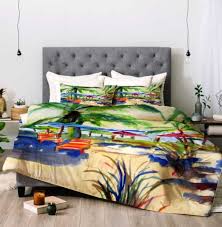 Look for luxury as well as casual beach home bedding: Caribbean Time Comforter Laura Trevey Watercolor Designs