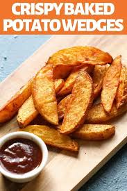These Crispy Baked Potato Wedges Are The Ultimate Side Dish For Just About Anything They Potato Wedges Baked Crispy Baked Potatoes Baked Potato Wedges Recipe