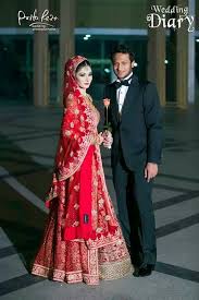 Sakib Al Hasan Umme Ahmed Shishir Sabyasachi Pakistani Fashion Red Lehenga Asian Wedding