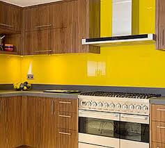 Colored glass backsplashes for kitchens and bathrooms. Back Painted Glass On Walls Commercial Interior Design News