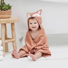 Pick a warm room with a flat surface, like a bathroom or kitchen counter, a changing table, or a bed. Elegant Baby Fox Hooded Towel Stitch Sensations