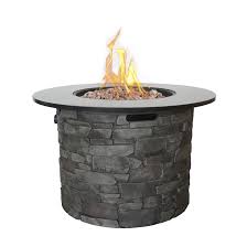 Many natural gas fire pit are raised above the patio with stone, brick, or copper designs. Canyon Ridge Outdoor Round Gas Fire Table 50 000 Btu Grey 52057 Rona