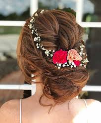 These long gorgeous braids, wrapped around or straight down, highlight an organic yet trendy look. 20 Wedding Hairstyles Within Flowers For Bride Ibaz Hair Styles Indian Wedding Hairstyles Bridal Hair Inspiration