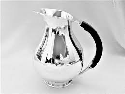 Un obiect de argint înnegrit; Aer CondiÈionat A Atrage Misto Carafe Stefaniaddolan Justan Net