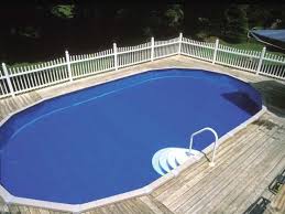Above Ground Pool With Fenced Deck Above Ground Pool Decks Pool Landscaping Backyard Pool