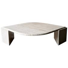 The cocktail table which became popular in the roaring 20's is a low rectangular or square table used to serve cocktails, hold books, accessories and ash trays (back in the day). Italian Travertine Marble Teardrop Coffee Cocktail Table At 1stdibs