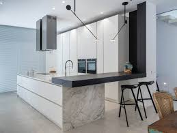 Light grey kitchen with wood worktop maintenance connection. Kitchen Worktops Cosentino