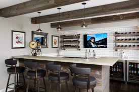 Look towards the space under the staircase as an opportunity to shape the stylish bar. 26 Modern Basement Bar Ideas And Designs For 2021 Photos